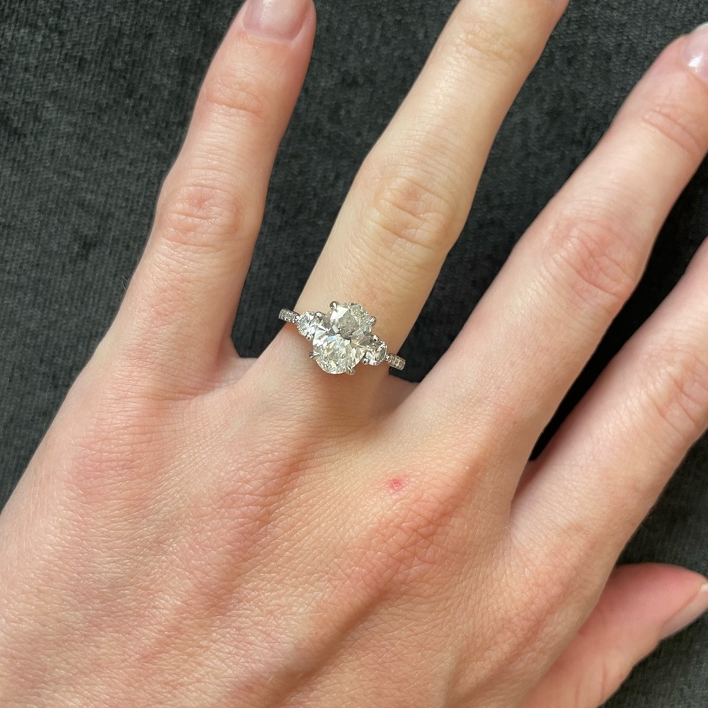Custom white gold trilogy engagement ring